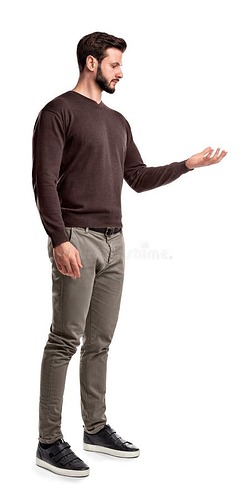 young-man-fashionable-casual-closes-stands-side-view-looks-one-hand-turned-up-as-if-holding-something-new-product-124453161